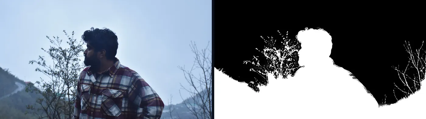 The graded hillside portrait beside its matte: the hills, trees and figure in white against a black sky.